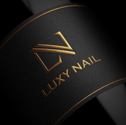 Luxy Nails & Spa logo