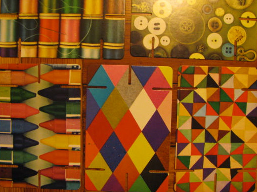 cards with pictures of thread, buttons, and quilt-like geometric patterns