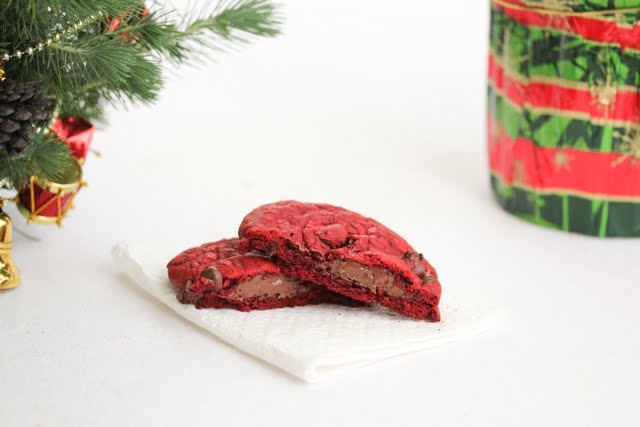 photo of a Nutella filled Red Velvet Cookie on a napkin