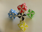 Tetrahedra of Five Pinwheel Cubes in Tomoko Fuse's "Multimensional Transformations: Unit Origami"