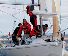 J/80 one-design sailboats- match race sailing in England at RYA regatta