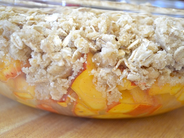 build crisp in baking pan (peaches on bottom and crumble on top) 
