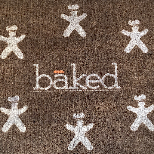 bāked Cafe & Bakery logo