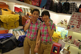 two young women working in a bag store at Dongmen in Shenzhen, China