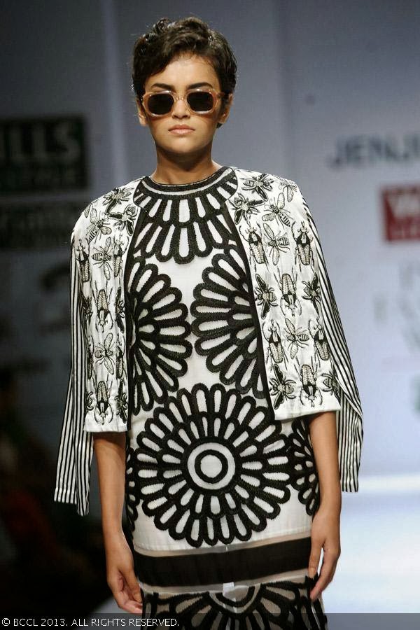 Natasha showcases a creation by fashion designer Jenjum Gadi on Day 3 of Wills Lifestyle India Fashion Week (WIFW) Spring/Summer 2014, held in Delhi.