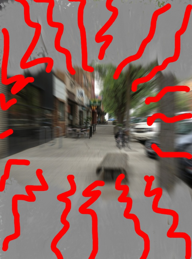 Same blurred street scene with red, jagged lines around the periphery representing pain and discomfort.