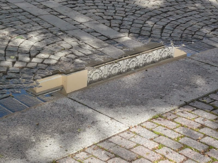 Взгляд сквозь лужу: отражения мира в фотографиях