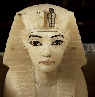 Canopic Stopper - A large container with four hollowed out sections held the internal organs of the king. Each of its compartments had a lid in the form of Tutankhamun’s head. The royal name on both the chest and its outer shrine appears original, suggesting that Tutankhamun did not usurp the container from a predecessor.