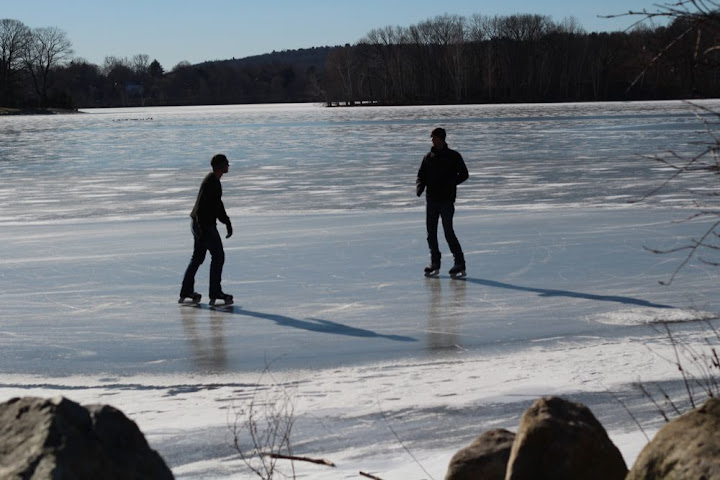 skaters on Spy Pond