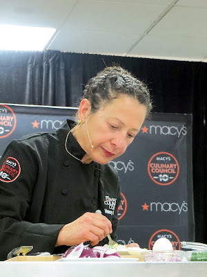 Culinary Council Recap: Nancy Silverton, Culinary Council member at the Macy's at Washington Square Dec 14, 2013, preparing to plate her recipe for Burrata with Caviar