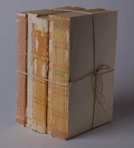 vertical deconstructed paper back books twine bows