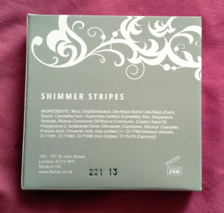 A picture of the back of the box of Lily Lolo Shimmer Stripes in Honey Glow 