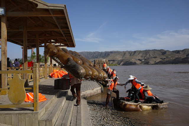 carry sheep skin raft at Shapotou in Ningxia