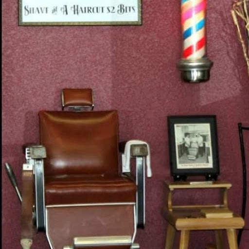 Regency Barber Shop logo