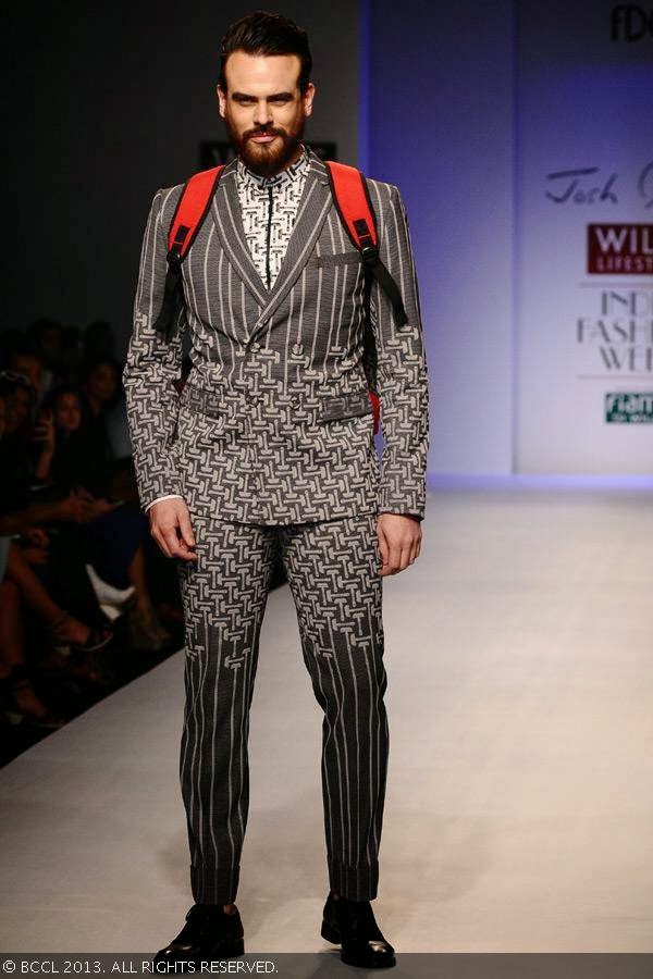 Andy walks the ramp for fashion designer Josh Goraya on Day 5 of Wills Lifestyle India Fashion Week (WIFW) Spring/Summer 2014, held in Delhi. 