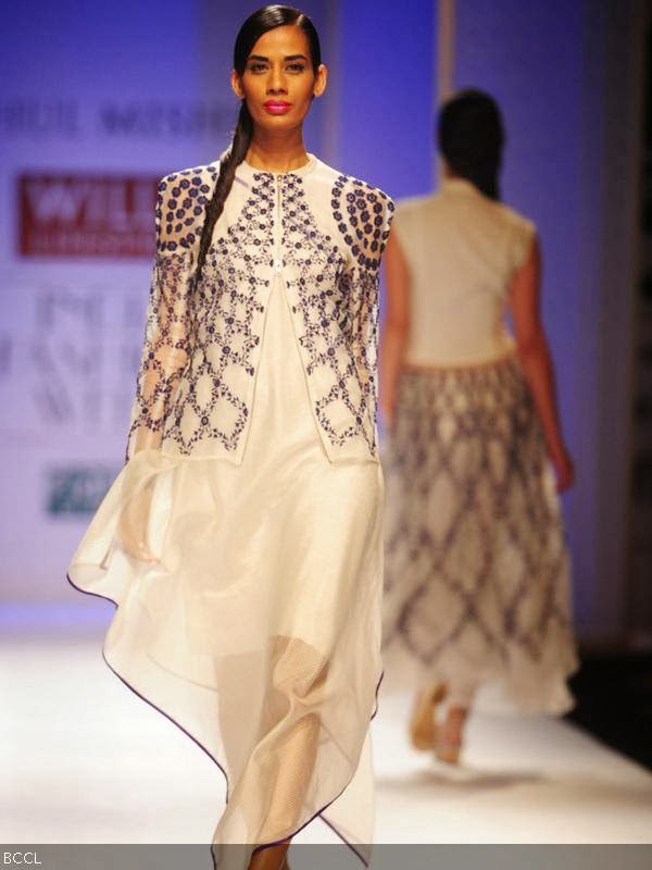 Sony Kaur walks the ramp for fashion designer Rahul Mishra on Day 2 of the Wills Lifestyle India Fashion Week (WIFW) Spring/Summer 2014, held in Delhi.