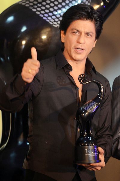 Shah Rukh Khan gives a 'thumbs up' at the unveiling of 'Times of India Film Awards' trophy, held in Mumbai on January 29, 2013.