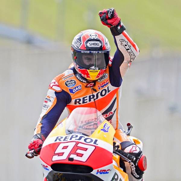 Honda rider Marc Marquez of Spain celebrates after winning the MotoGP race of the Grand Prix of Germany at the Sachsenring Circuit, on July 13, 2014, in Hohenstein-Ernstthal, eastern Germany.