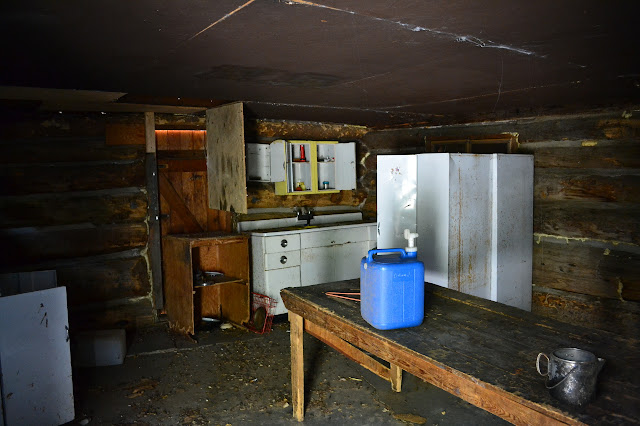 cupboards and table inside the open building