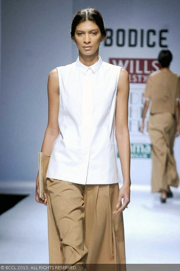A model flaunts a creation by fashion designer Ruchika Sachdev on Day 3 of Wills Lifestyle India Fashion Week (WIFW) Spring/Summer 2014, held in Delhi.