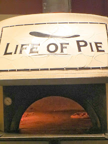 The pride of Life of Pie and the source of amazing pizzas is a 6,900 pound wood fired pizza oven, hand-made by the legendary Stefano Ferrara in Napoli, Italy