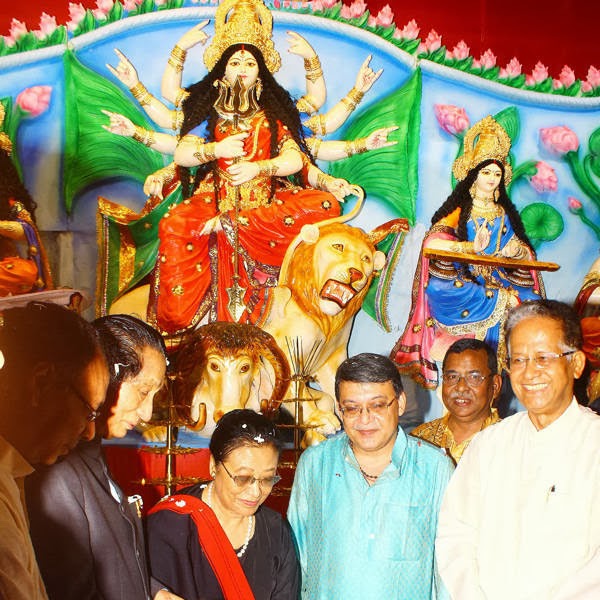 Chief minister of Assam Tarun Gogoi(R) ,governor of Orissa S C Jamir(L) and first Lady of Orissa Mrs S C Jamir in a inaugration programme of Entally udayan Sangha Durga Puja on Wednesday in Kolkata.