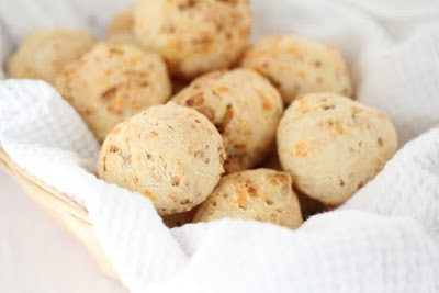 close-up photo of a basket of cheese breads