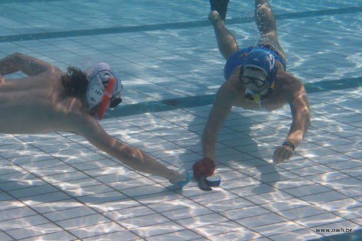 Hockey on the bottom of a pool