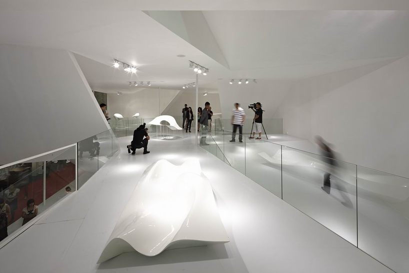  'folding house' booth design by standardarchitecture