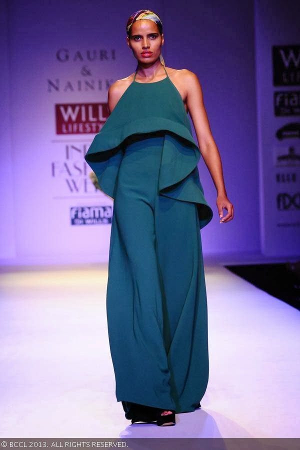 Preeti walks the ramp for fashion designers Gauri and Nainika on Day 1 of the Wills Lifestyle India Fashion Week (WIFW) Spring/Summer 2014, held in Delhi.