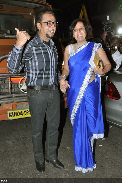 Gulshan Grover gets strong hold of good friend Anuradha Sawhney during the latter's book launch, held in Mumbai on February 4, 2013. (Pic: Viral Bhayani)