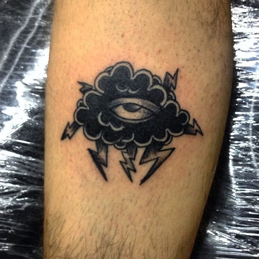 Little Black Cloud tattoo with eye and thunder