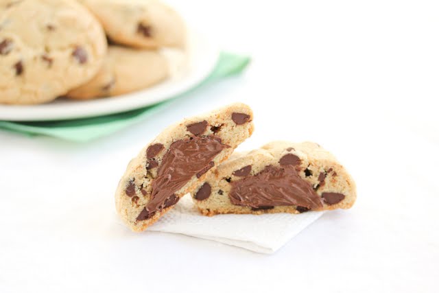 a cookie split in half to show the Nutella center