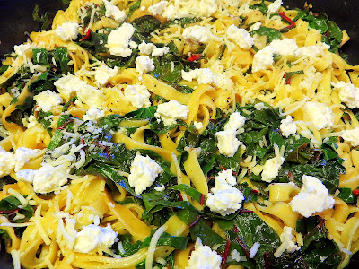 Blue House Greenhouse Farms chard sauteed with garlic in olive oil with fresh ricotta and fettuccini