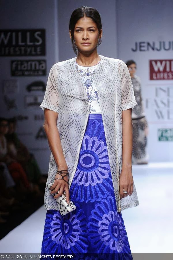 Carol Gracias walks the ramp for fashion designer Jenjum Gadi on Day 3 of the Wills Lifestyle India Fashion Week (WIFW) Spring/Summer 2014, held in Delhi.
