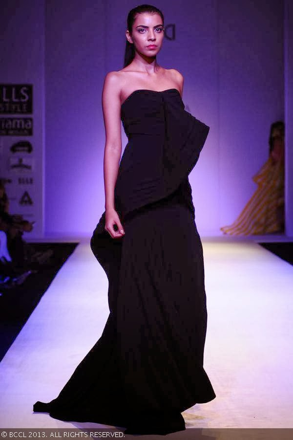 Arshiya walks the ramp for fashion designers Gauri and Nainika on Day 1 of the Wills Lifestyle India Fashion Week (WIFW) Spring/Summer 2014, held in Delhi.