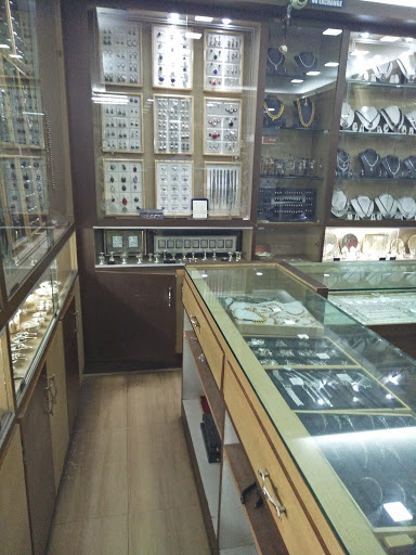 Anvekar Jewellers, shop no 4 c m c complex, College Rd, Madikeri, Karnataka 571201, India, Jeweller, state KA