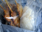 Moo Bing, or a grilled pork, pork skewers, Thai breakfast, Thai street food