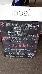 Pine Mountain + Deeproots bacon green bean onigiri at the Hollywood location of the Portland Farmers Market
