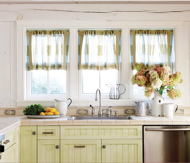 Nantucket dream home kitchen with green cabinets