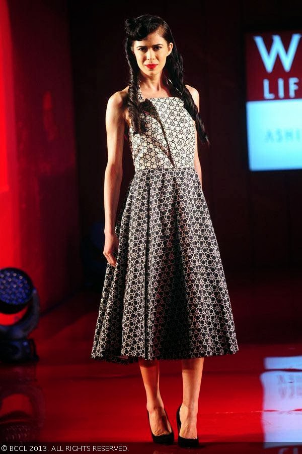 Sucheta Sharma showcases a creation by fashion designer Ashish N Soni during the grand finale of the Wills Lifestyle India Fashion Week (WIFW) Spring/Summer 2014, held in Delhi.