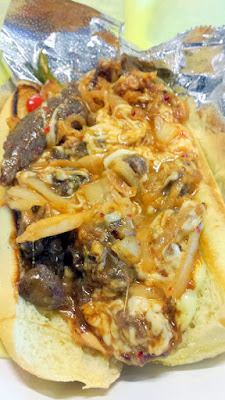 Koi Fusion Korean Cheessteak with Short Rib (my choice of protein), grilled bulgogi, sauteed onions and peppers, melted cheese, sauteed kimchi, wasabi mayo and Korean spread on a toasted bun