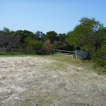 Locked management gate near coastal cemetery (310460)