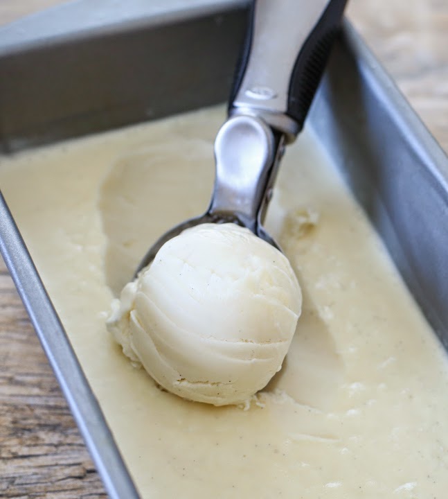 overhead photo of an ice cream scoop scooping some gelato