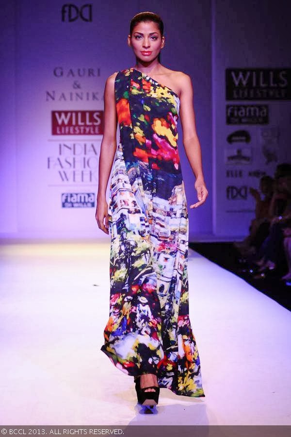 Donna showcases a creation by fashion designers Gauri and Nainika on Day 1 of Wills Lifestyle India Fashion Week (WIFW) Spring/Summer 2014, held in Delhi.