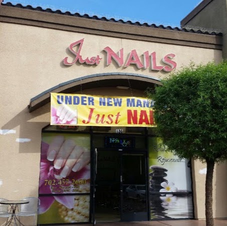 Just Nails & Spa logo