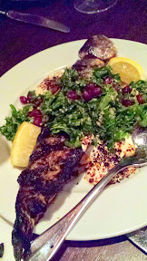 Cafe Castagna shared dish of whole grilled trout with tabbouleh, sorrel, tahini, pomegranate