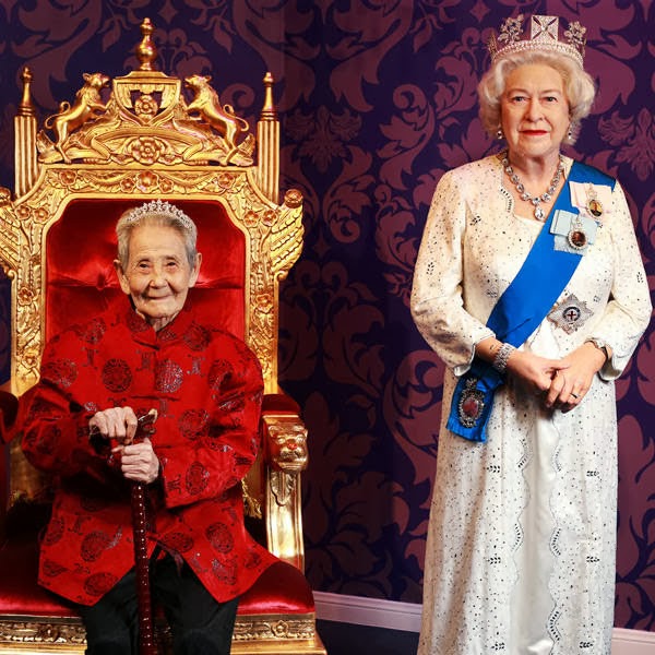 Li Xianying (L), a 101-year-old Chinese woman, sits in a chair as she poses for a photograph with the wax figure of Britain's Queen Elizabeth during a photo opportunity to celebrate the Double Ninth Festival, or Chongyang Festival, at Madame Tussauds Museum in Wuhan, Hubei province October 11, 2013.