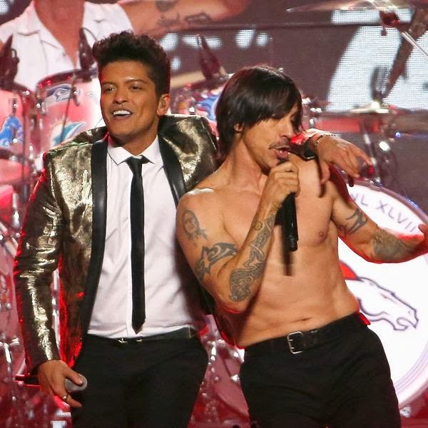 Bruno Mars (L) and Anthony Kiedis of the Red Hot Chili Peppers perform during the Pepsi Super Bowl XLVIII Halftime Show at MetLife Stadium on February 2, 2014 in East Rutherford, New Jersey.