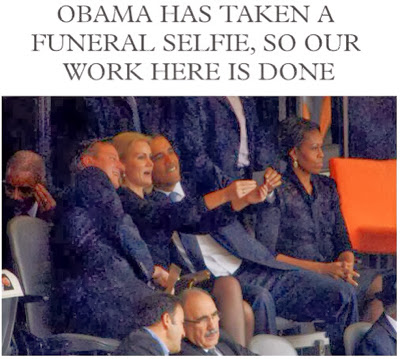 President Obama in trouble for taking pic at historic event